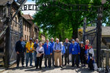 YU President Berman (center) leads a delegation of university presidents to Auschwitz for the 2024 International March of the Living