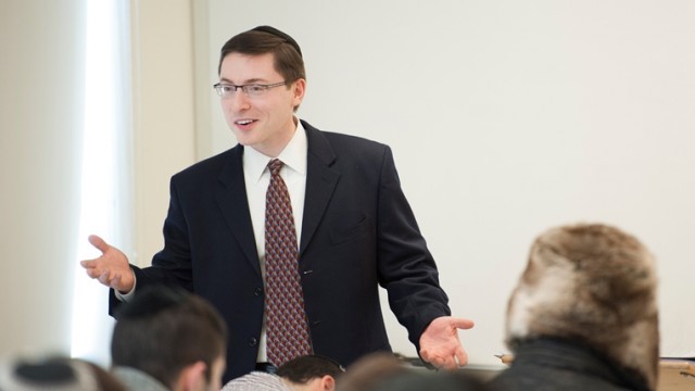 Dr. Eliezer Schnall teaches into the psychology class at Yeshiva College