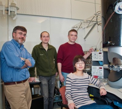 Dr. Anatoly Frenkel, second from right, and Dr. Yuanyuan Li, right, are part of a team of scientists conducting cutting-edge research on catalytic reactions. 