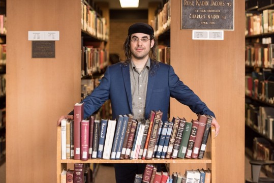 Portrait of Gabriel Wasserman, a Revel student who is graduating this year, whom is being highlighted this year for his accomplishments. Among them, he has written a Haggadah.