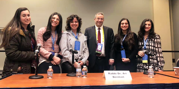 Dr. Berman with students after his panel discussion