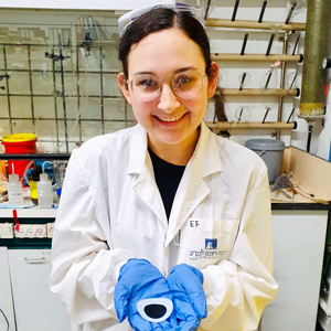 Eliana Felder holds one of the nanotechnology films she created in the lab.