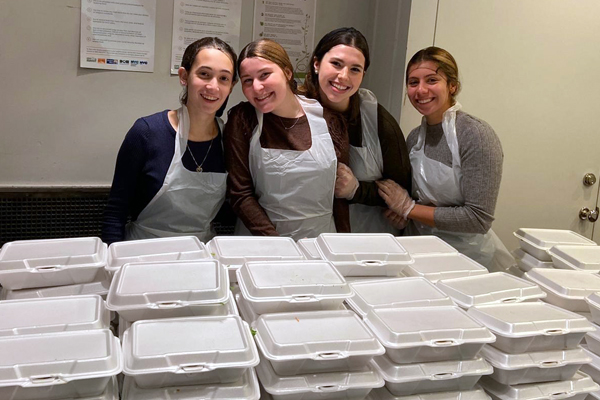 Four volunteers working at the Grand Central Food Program