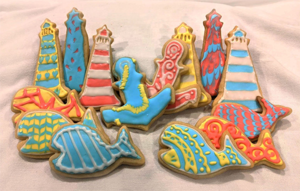 Collection of cookies decorated in sea themes and colors.